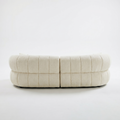 Sfeerco Arco 102 inch curved cloud sofa front view beige quilted textured upholstery white background