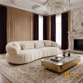 Sfeerco Arco modern curved sofa in classic European living room with warm lighting