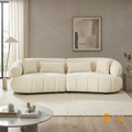 Sfeerco Arco curved cloud sofa in minimalist living room warm neutral interior