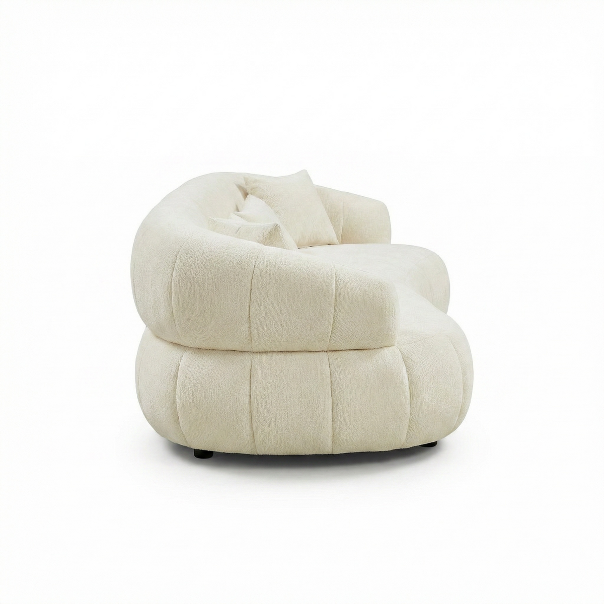 Sfeerco Arco curved sectional sofa overhead angle view showing sculptural silhouette and beige fabric