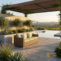 Sfeerco Bryne natural tone rattan sofa on stone terrace with desert garden and pool in background