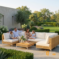 Sfeerco Capri navy outdoor rattan sectional sofa set styled in tropical garden patio setting with family