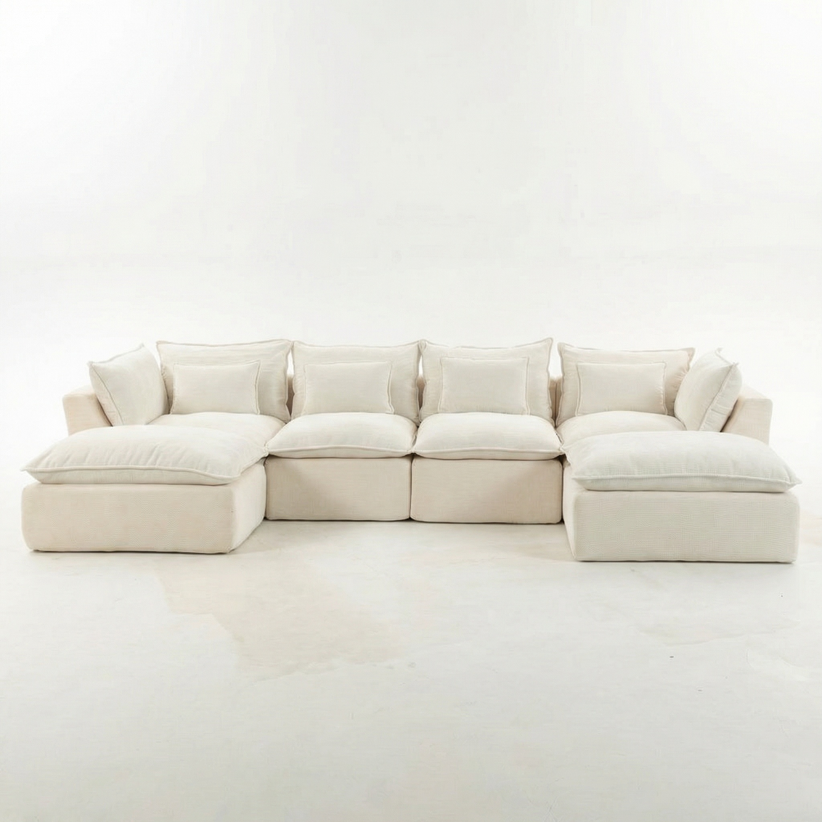 Sfeerco Cumulo oversized modular cloud sectional sofa with 2 ottomans in antique white velvet studio shot