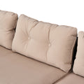 Close-up of tufted beige seat cushion on Sfeerco Laguna outdoor rattan sofa