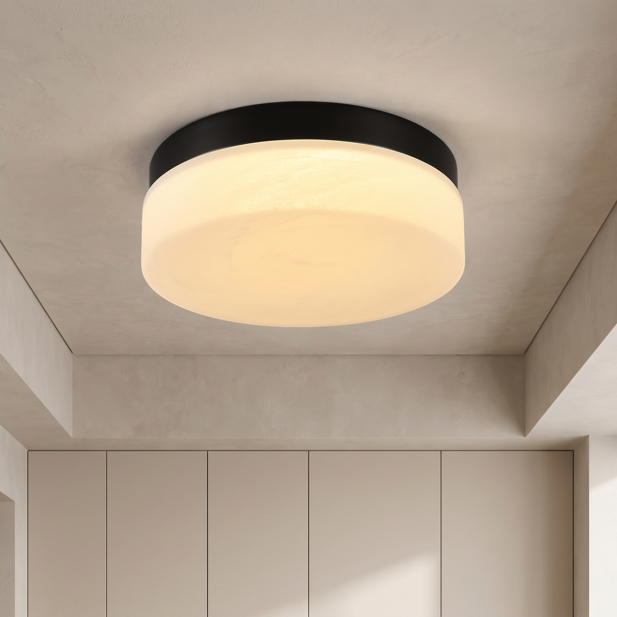 Sfeerco Nero 12-inch round flush mount LED ceiling light in black with marble glass shade installed in modern living room