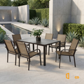Sfeerco Porto 7-piece patio dining set styled on modern outdoor terrace with pool and garden backdrop