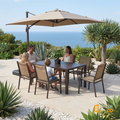 Sfeerco Porto outdoor dining set with umbrella on coastal patio with ocean view