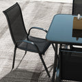 Close-up of Sfeerco Riviera stackable outdoor dining chair showing breathable mesh seat and curved design