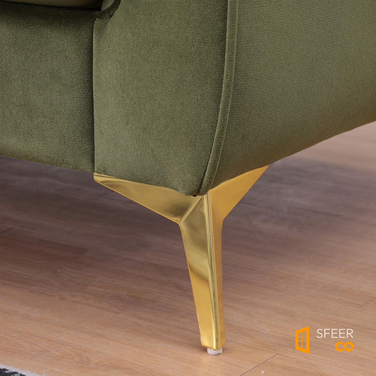 Close-up of gold metal leg detail on Sfeerco Stanford sage green velvet Chesterfield sofa