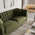 Sfeerco Stanford green tufted velvet sofa styled in warm contemporary living room
